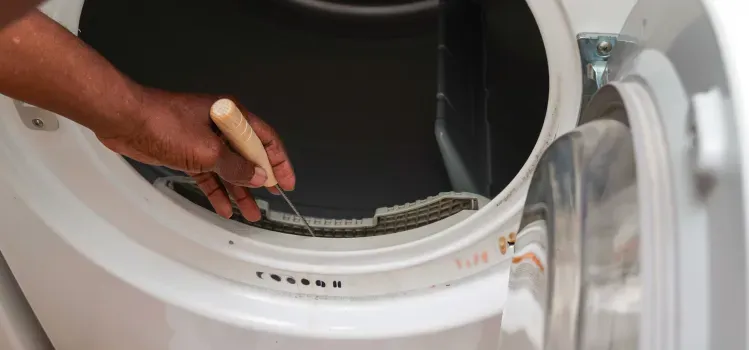 mans-hand-dryer-lint-trap-maintenance